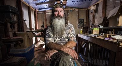 This undated image released by A&amp;E shows Phil Robertson from the popular series &quot;Duck Dynasty.&quot; Robertson was suspended for disparaging comments he made to GQ magazine about gay people but was reinstated by the network on Friday, Dec. 27, 2013. In a statement , A&amp;E said it decided to bring Robertson back to the reality series after discussions with the Robertson family and &quot;numerous advocacy groups.&quot; (AP)