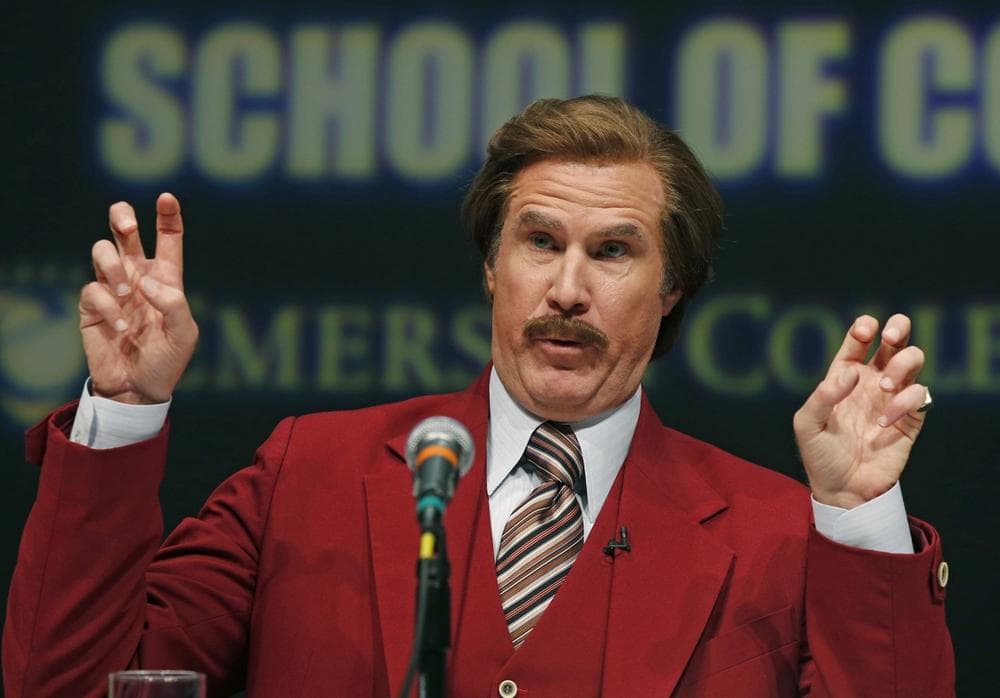 Actor and comedian Will Ferrell, who plays TV anchorman Ron Burgundy, stays in character during a news conference at Emerson College in Boston, Wednesday, Dec. 4, 2013. The school has changed the name of its School of Communication for one day to honor the fictitious television anchorman. (AP Photo/Elise Amendola)