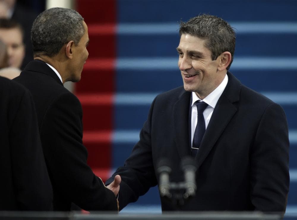 President Barack Obama, left, shakes hands with poet Richard Blanco during the ceremonial swearing-in West Front of the U.S. Capitol during the 57th Presidential Inauguration in Washington, Monday, Jan. 21, 2013. (AP Photo/Pablo Martinez Monsivais)