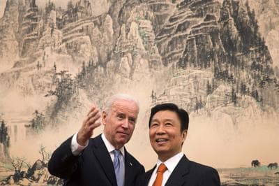 U.S. Vice President Joe Biden, left, chats with his Chinese counterpart Li Yuanchao before heading to their luncheon at the Diaoyutai State Guesthouse in Beijing, China Thursday, Dec. 5, 2013. (AP)