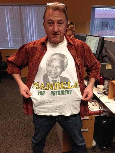 On Point producer Stefano Kotsonis shows off his &quot;Mandela For President&quot; t-shirt in the WBUR offices. (Nick Andersen / WBUR)