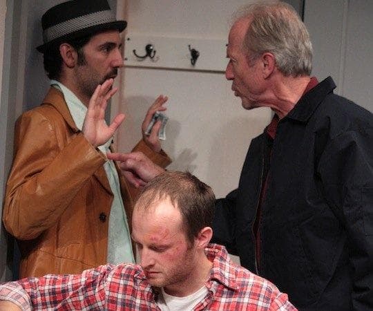 Alex Pollock (foreground), Nael Nercer and Will Lyman in “Windowmen.” (Courtesy, Boston Playwrights' Theatre)