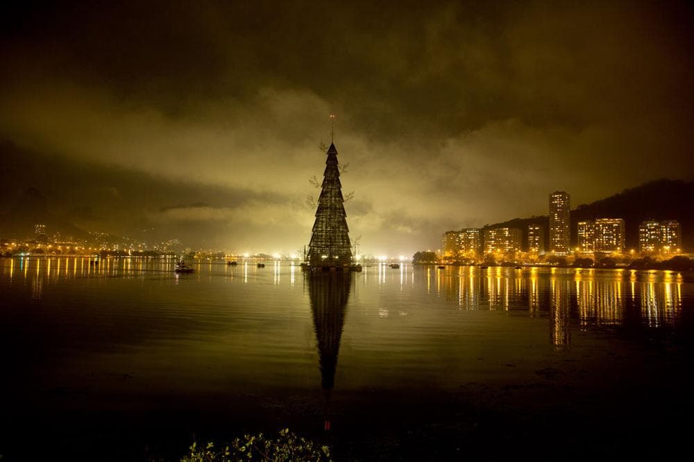 A Christmas tree (pictured above and at top) floats in Lagoa Lake during the annual holiday tree lighting in Rio de Janeiro, Brazil, on Nov. 30, 2013. (AP Photo/Victor R. Caivano)
