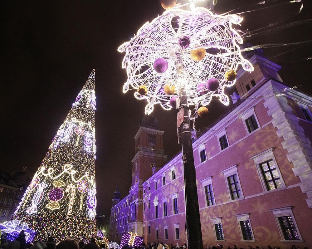 Christmas illuminations light up Royal Treaty Street in Warsaw, Poland, on Dec. 7, 2013. (AP Photo/Czarek Sokolowski)