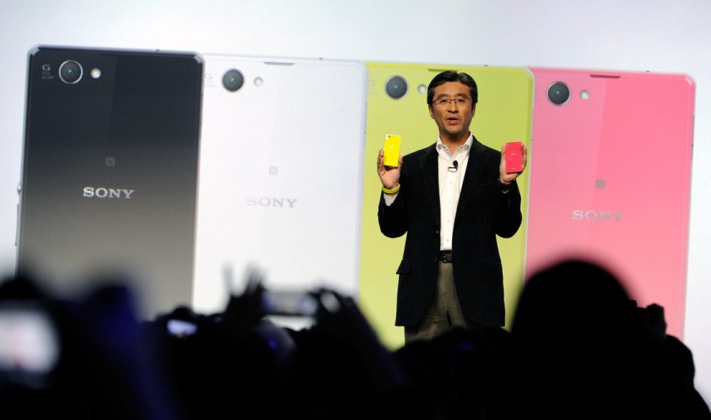 Sony Executive Vice President of Sony Corporation and Sony Mobile Communications President and CEO Kunimasa Suzuki displays a Sony Xperia Z compact phone during a Sony press event at the Las Vegas Convention Center for the 2014 International CES on January 6, 2014 in Las Vegas, Nevada. (David Becker/Getty Images)
