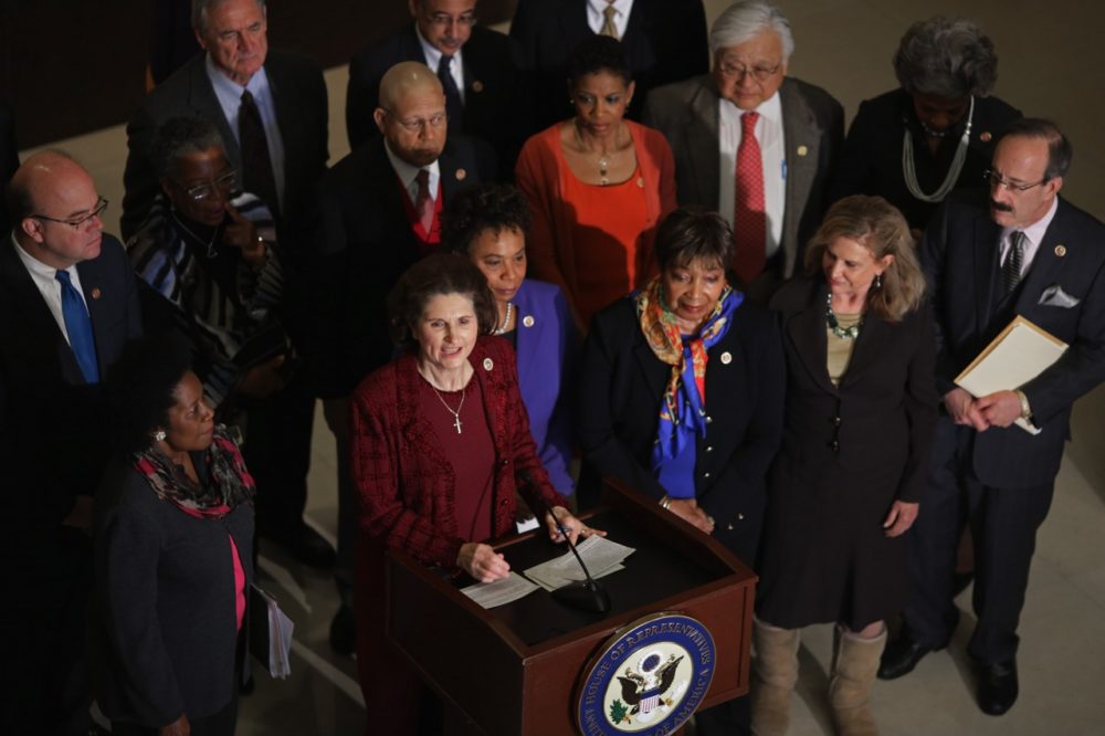 Lynda Johnson Robb, daughter of President Lyndon Johnson and wife of former Sen. Chuck Robb (D-Va.), is joined by Democratic members of the House of Representatives during an event marking the 50th anniversary of the start of the War on Poverty at the U.S. Capitol Visitors Center January 8, 2014 in Washington, DC. (Chip Somodevilla/Getty Images)