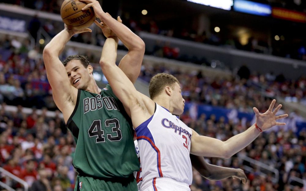 Boston Celtics forward Kris Humphries, left, pulls a rebound away from Los Angeles Clippers forward Blake Griffin. (AP/Chris Carlson)