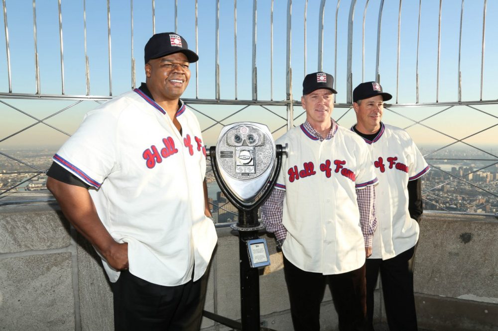 Frank Thomas, Tom Glavine, and Greg Maddux pose atop the Empire State Building. The trio will meet again in Cooperstown. (Rob Kim/Getty Images)