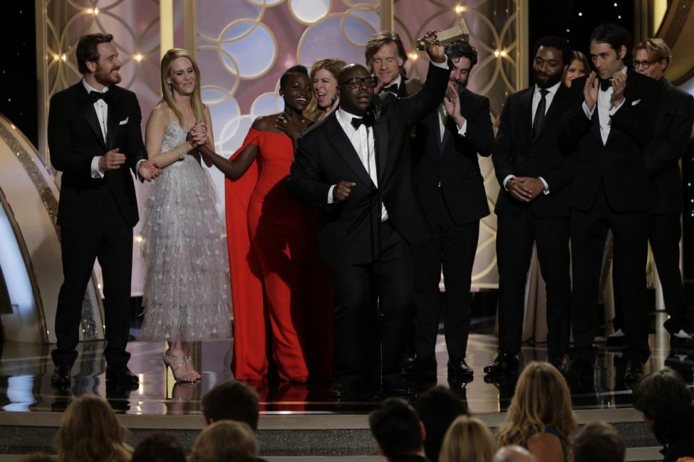  Steve McQueen and the cast of &quot;12 Years A Slave&quot; accept the award for Best Motion Picture, Drama during the 71st Annual Golden Globe Award at The Beverly Hilton Hotel on January 12, 2014 in Beverly Hills, California. (Photo by Paul Drinkwater/NBCUniversal via Getty Images)