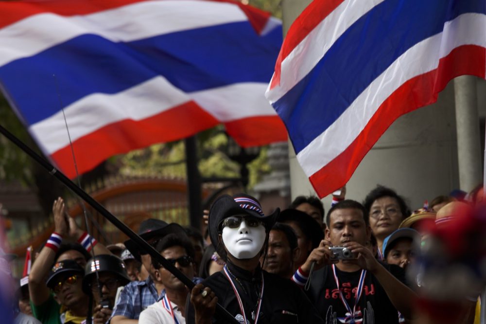 Anti-government protesters demonstrate in front of the Royal Thao Police headquarters on January 14, 2014 in Bangkok, Thailand. (Ed Wray/Getty Images)