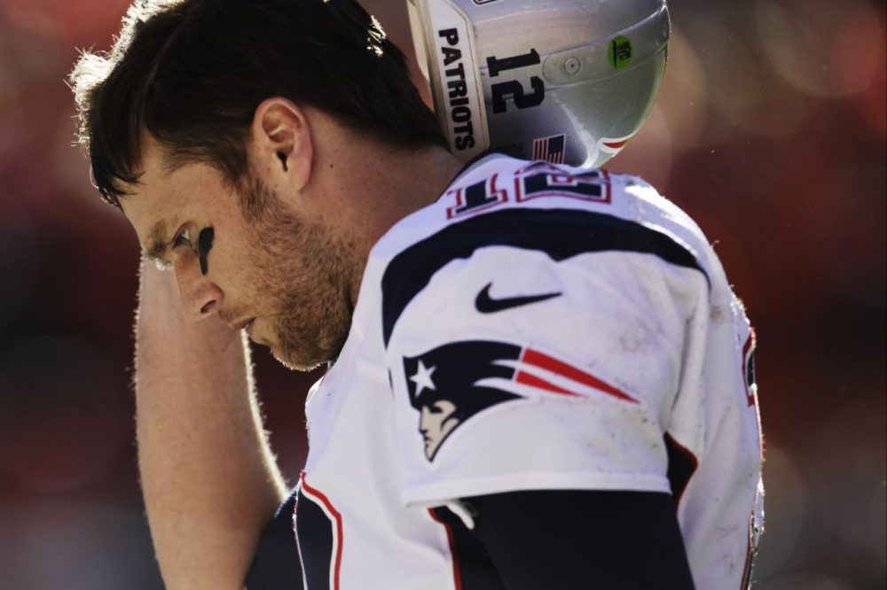 Tom Brady and the New England Patriots fell to the Broncos in the AFC Championship. (Joe Mahoney/AP)