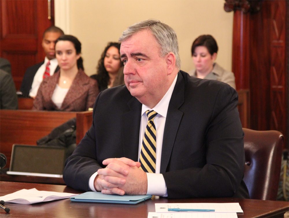 Former Boston Police Commissioner Edward Davis speaks before a special commission to study the feasibility of hosting the the 2024 Summer Olympics in Massachusetts. (State House News Service)