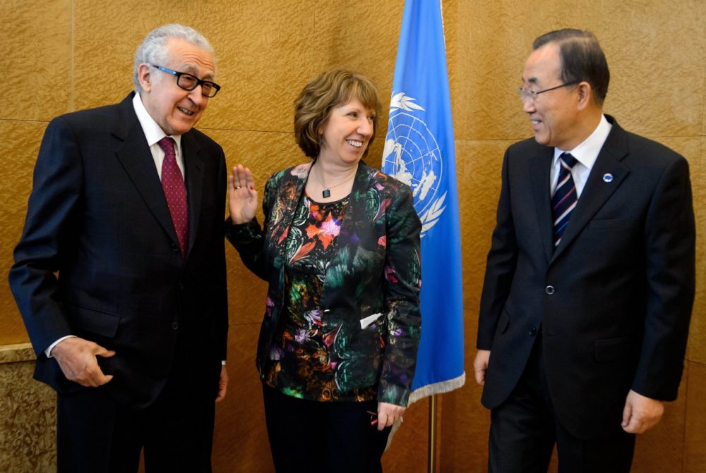 U.N-Arab League envoy for Syria Lakhdar Brahimi, left, European Union Foreign Policy Chief Catherine Ashton and United Nations Secretary General Ban Ki-Moon pose for the media prior to a meeting at the United Nations offices in Geneva, Tuesday Jan. 21, 2014, ahead of the Geneva II conference in Montreux. Russia and Iran criticized the U.N. chief's decision to withdraw Tehran's invitation to join this week's peace conference on Syria, as delegates began to arrive in Switzerland on Tuesday for the long-awaited talks.(Fabrice Coffrini/AP)