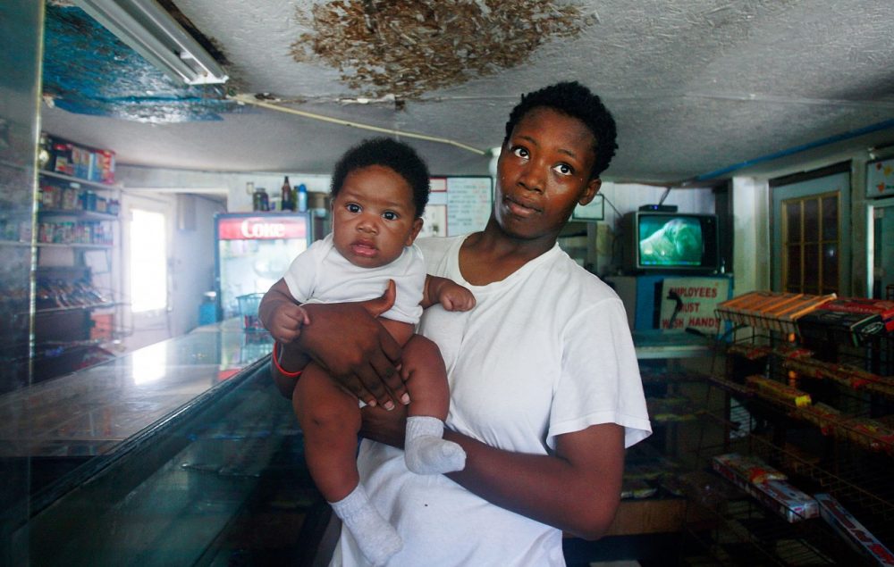 Shae Hill holds her daughter Fredderio, 3 months, inside a store May 7, 2009 in Glendora, Mississippi. The highly impoverished rural town has very few jobs and no public transportation. The recession has hit many Americans hard, but the rural Lower Mississippi Delta region has had some of the nation's worst poverty for decades. (Mario Tama/Getty Images)