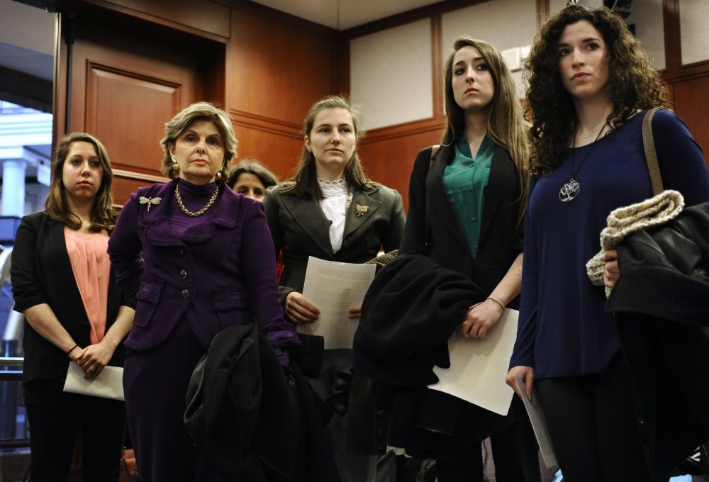 Attorney Gloria Allred, second right, stands with clients Erica Daniels, left, Kylie Angell, center, Carolyn Luby, second from right, and Rosemary Richi. The women, who say they were victims of sexual assaults while students at UConn, have filed a federal discrimination lawsuit. (Jessica Hill/AP)