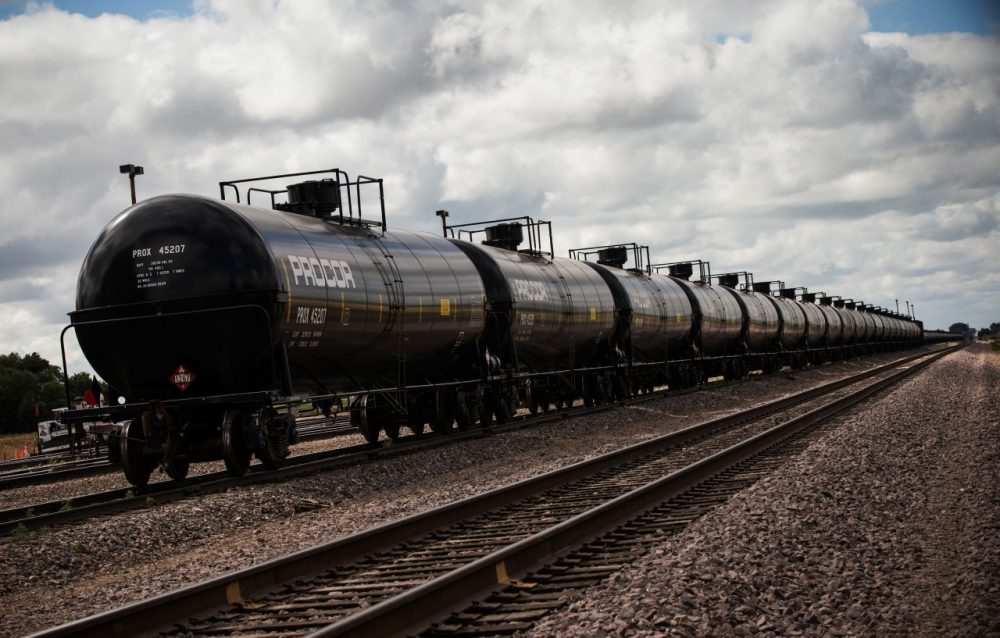 Oil containers sit at a train depot on July 26, 2013 outside Williston, North Dakota. (Andrew Burton/Getty Images)