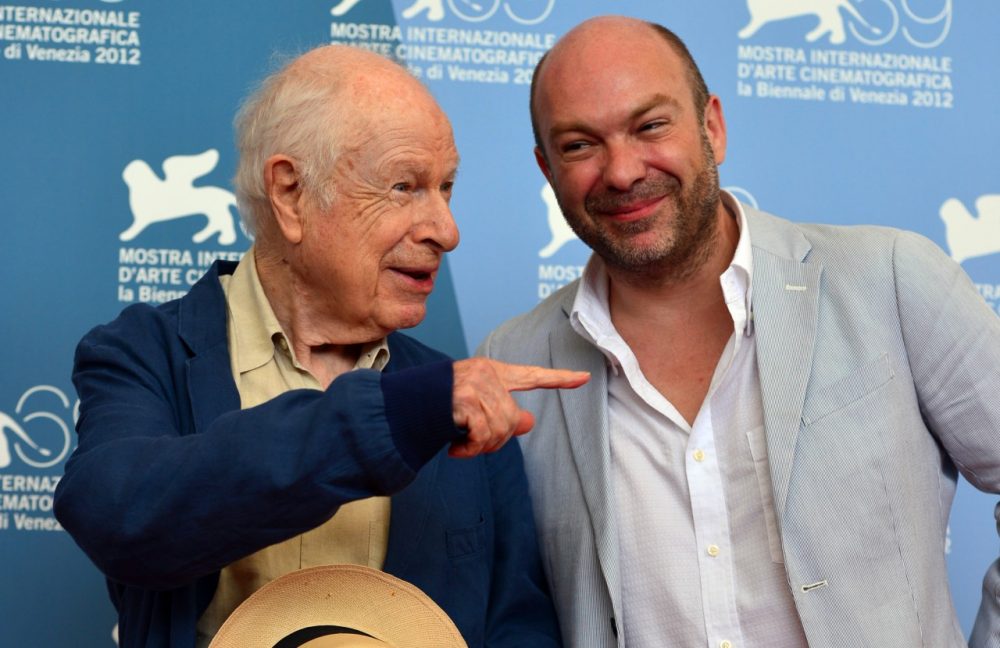 Theatre and film director Peter Brook, left, and his son, director Simon Brooks, pose during the 69th Venice Film Festival on September 5, 2012 at Venice Lido. (Gabriel Bouys/AFP/Getty Images)