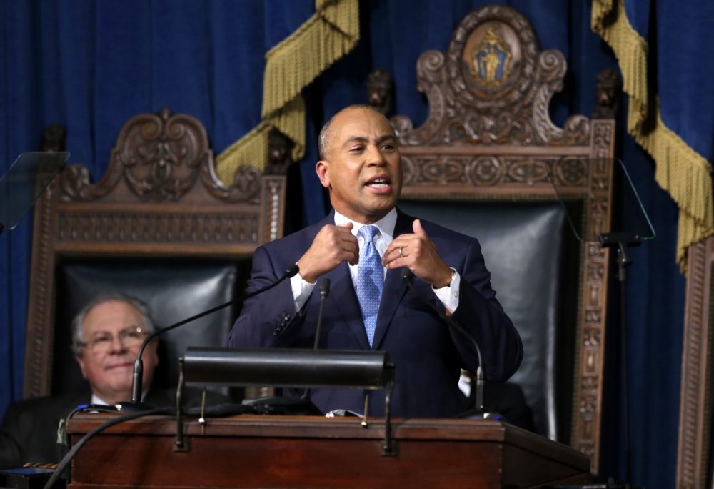 Massachusetts Gov. Deval Patrick, right, delivers his State of the State address in the House chamber at the Statehouse, Tuesday, Jan. 28, 2014, in Boston. While the economy continues to recover, the governor says many people in the state are still being left behind. Mass. Speaker of the House Robert DeLeo is seated at left. (AP)