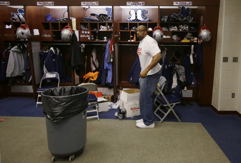 New England Patriots defensive end Andre Carter packs up his locker at the NFL football team's facility in Foxborough, Mass., Monday, Jan. 20, 2014. The Patriots lost to the Denver Broncos in the AFC Championship game Sunday in Denver ending their season. (AP)