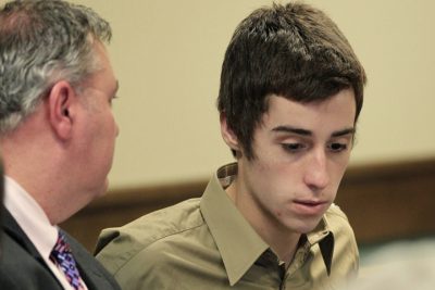 T.J. Lane, right, listens to his attorney during court proceedings in Juvenile Court Tuesday, March 6, 2012, in Chardon, Ohio. Lane has been charged with three counts of aggravated murder in the killings of students Demetrius Hewlin, Russell King Jr . and Daniel Parmertor. (AP)