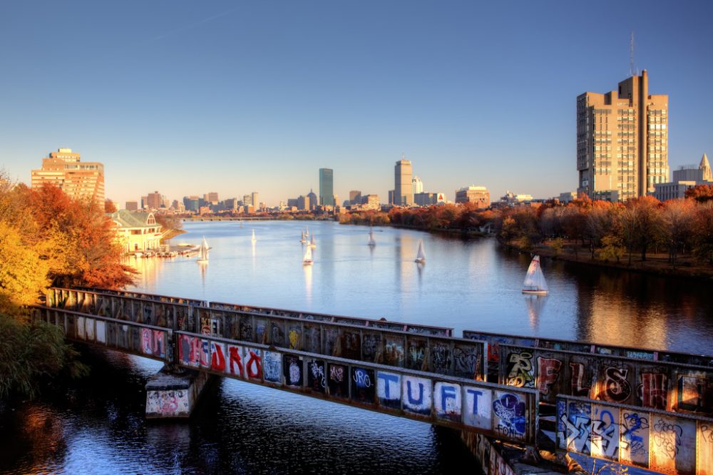 As the only spot in the U.S. where a boat can sail under a train driving under a car driving under an airplane, the B.U. bridge also offers a unique angle of the Boston skyline. (Nathan Lanier/Flickr)