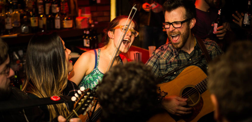The Tuesday night bluegrass jam session at the Cantab Lounge in Cambridge. (Jason Jong)