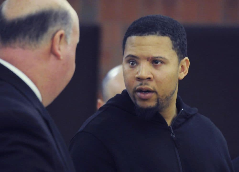In this file photo, Alexander Bradley speaks with his attorney at Hatford Superior Court. Bradley, who alleges he was shot by Aaron Hernandez in February, was shot several times Sunday night. (Richard Messina/The Hatford Courant/AP)