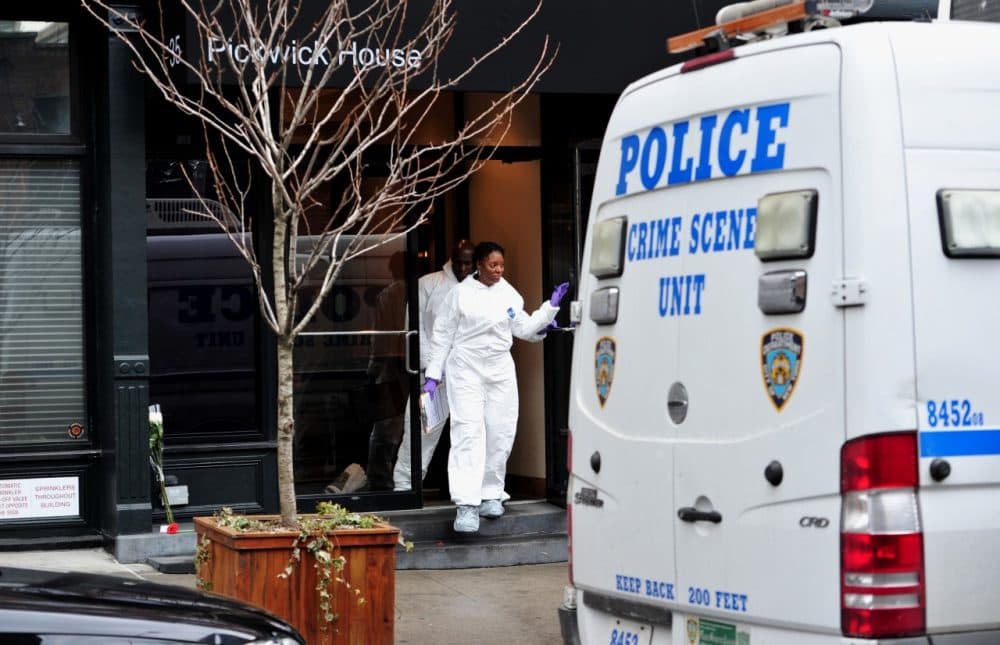 New York City Police Department investigators leave the apartment building of actor Philip Seymour Hoffman after he was reported dead on February 2, 2014 in the Greenwich Village area of New York. (Stan Honda/AFP/Getty Images)