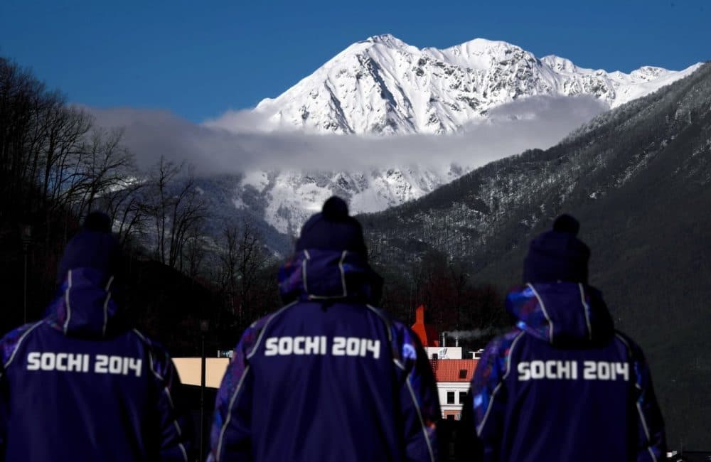 Plain-clothes policemen patrol the Rosa Khutor Alpine center in the mountain cluster on February 2, 2014 prior to the start of 2014 Sochi Winter Olympic Games. (Fabrice Coffrini/AFP/Getty Images)