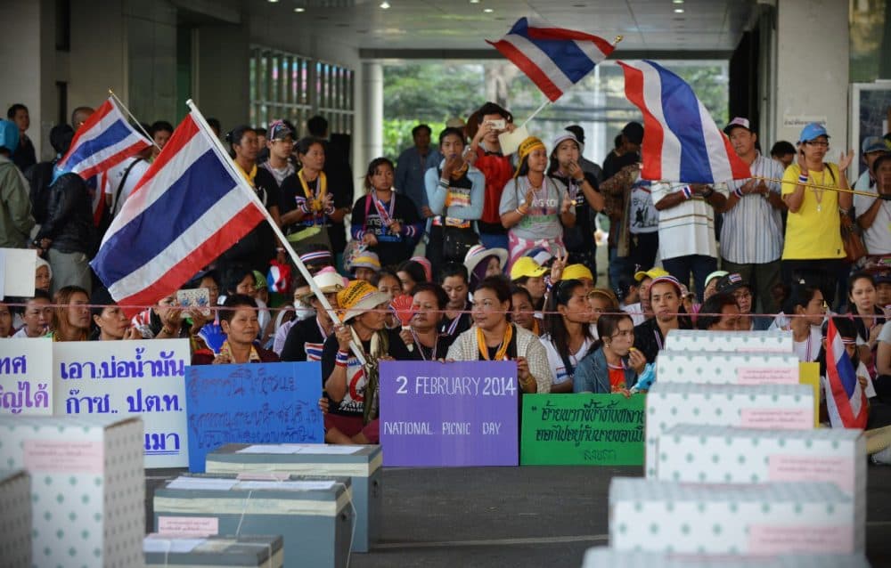 Anti-government protesters gather in front of ballot boxes in preventing voting at a polling station during Thailand's general election on February 2, 2014 in Bangkok, Thailand. (Rufus Cox/Getty Images)