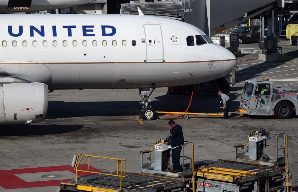 A United Airlines plane sits on the tarmac at San Francisco International Airport on January 23, 2014 in San Francisco, California. United Airlines parent company United Continental Holdings reported a surge in fourth quarter profits with earnings of $140 million compared to a loss of $620 million one year ago. (Justin Sullivan/Getty Images)
