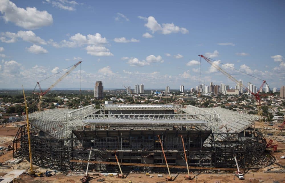 The Arena Pantanal stadium is under construction ahead of the 2014 World Cup soccer tournament in Cuiaba, Brazil, Thursday, Nov. 14, 2013. FIFA wants all World Cup stadiums completed by December. (Felipe Dana/AP)