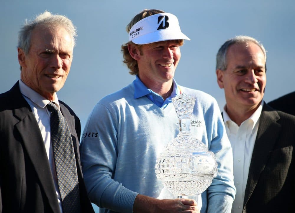 Clint Eastwood poses with Brandt Snedeker, winner of the 2013 AT&amp;T Pebble Beach National Pro-Am. Eastwood's contribution to this year's tournament has already been more significant.  (Jed Jacobsohn/Getty Images)