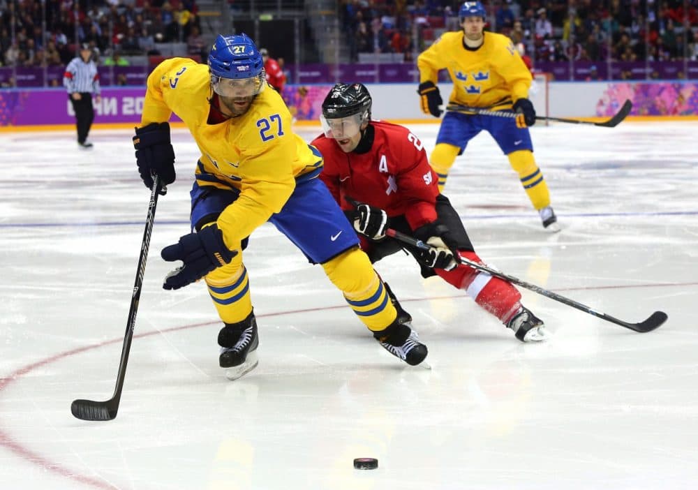 Men's ice hockey is one of the only sports filling the stands in Sochi. (Martin Rose/Getty Images)
