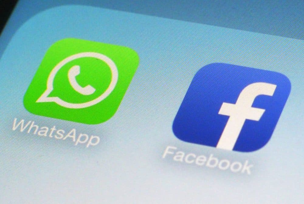 On Wednesday, the world's biggest social networking company announced it is buying mobile messaging service WhatsApp for up to $19 billion in cash and stock. (Patrick Sison/AP)