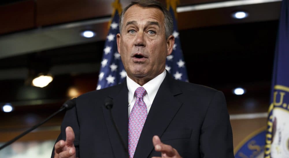 In this Feb. 6, 2014 file photo, House Speaker John Boehner of Ohio speaks during a news conference on Capitol Hill in Washington. In a concession to President Barack Obama and Democratic lawmakers, Boehner said the House would vote to increase the government's borrowing cap without trying to attach conditions sought by some Republicans. &quot;We'll let his party give him the debt ceiling increase that he wants,&quot; Boehner said, hours before the vote. (Scott Applewhite/AP)