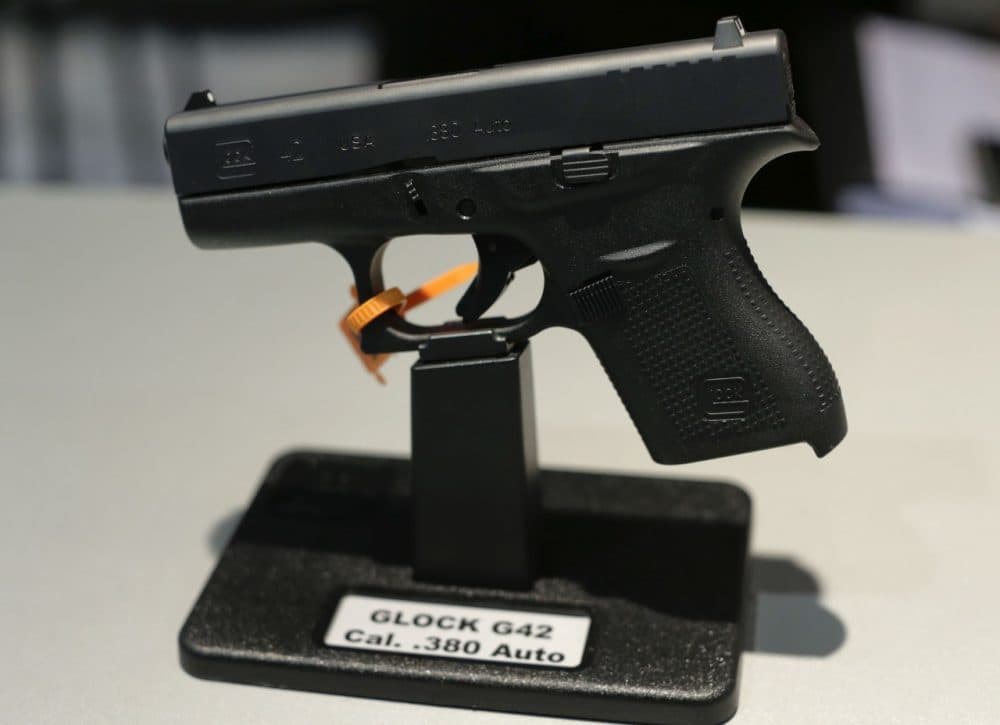 The Glock G42, .380 caliber Auto hand gun sits on display at the Glock display booth during the Shooting Hunting and Outdoor Trade Show, Tuesday, Jan. 14, 2014, in Las Vegas. (AP)