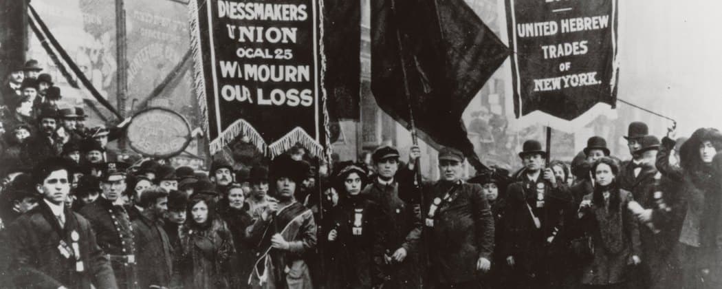 Workers gather after the 1911 Triangle Shirtwaist Factory fire in New York, which became a rallying cry for miserable working conditions. It's part of the backdrop for Alice Hoffman's &quot;The Museum of Extraordinary things.&quot; (AP/National Archives)