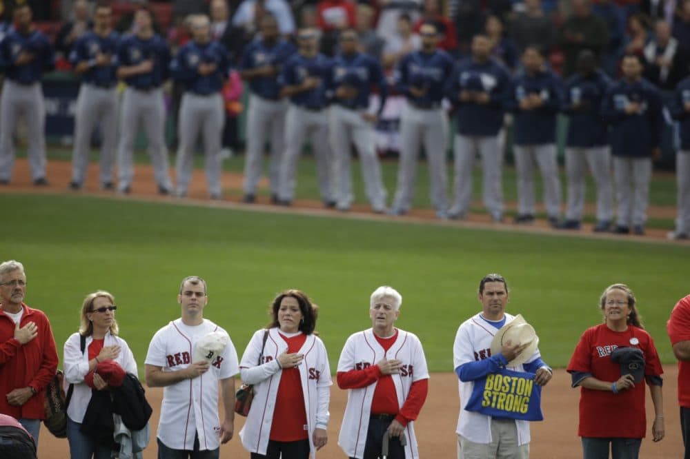 One of the few times many survivors of the Boston marathon bombing were together publicly was at Game 2 of the World Series in Boston. (AP/Stephan Savoia)
