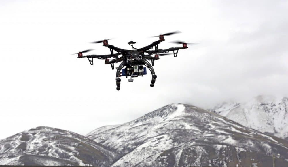 Members of the Box Elder County Sheriff's Office fly their search and rescue drone during a demonstration, in Brigham City, Utah. (Rick Bowmer/AP)