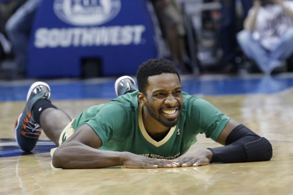 Boston Celtics forward Jeff Green lays on the floor after a turn over. (AP/LM Otero)