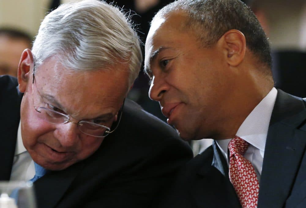 Former Boston Mayor Thomas Menino, left, and Gov. Deval Patrick huddle prior to their speeches at a forum Monday on lessons learned from the response to last year's Boston Marathon bombings. (Elise Amendola/AP)