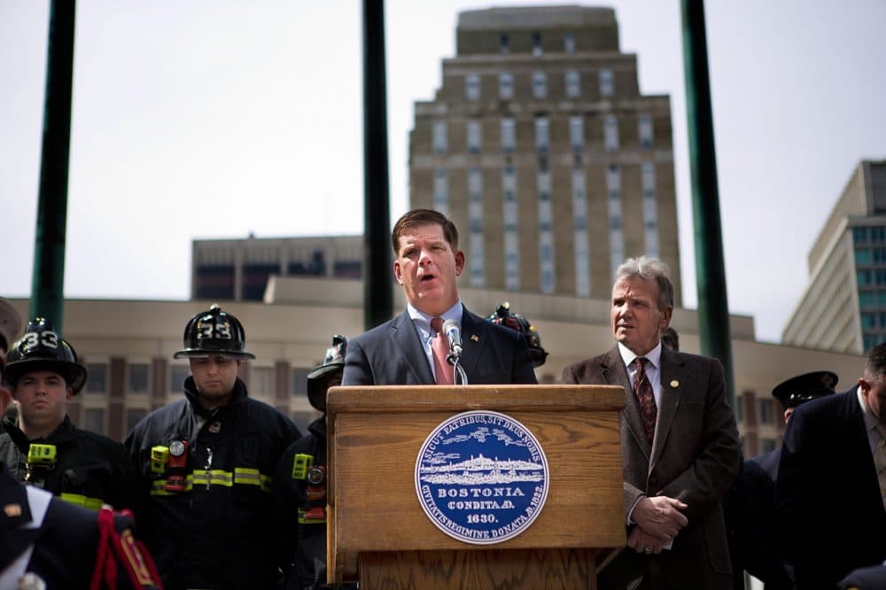 During the mayoral campaign, Marty Walsh argued that his union ties would give him a leg up in negotiations with city unions. Here, Walsh speaks in March after two city firefighters died battling a nine-alarm blaze. (Jesse Costa/WBUR)