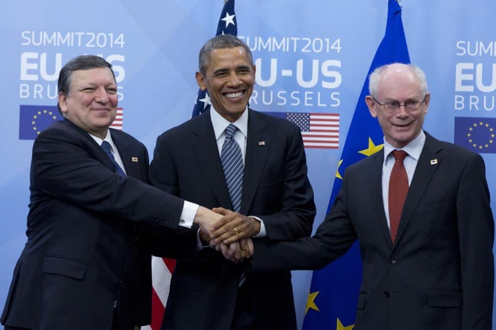 U.S. President Barack Obama, center, shakes hands with EU Council President Herman Van Rompuy, right, and EU Commission President Jose Manuel Barroso, left, prior to an EU-US summit meeting at the EU Council building in Brussels on Wednesday, March 26, 2014. Obama is on a one day trip to Belgium to meet EU officials and visit the WWI Flanders Field Cemetery. (AP)