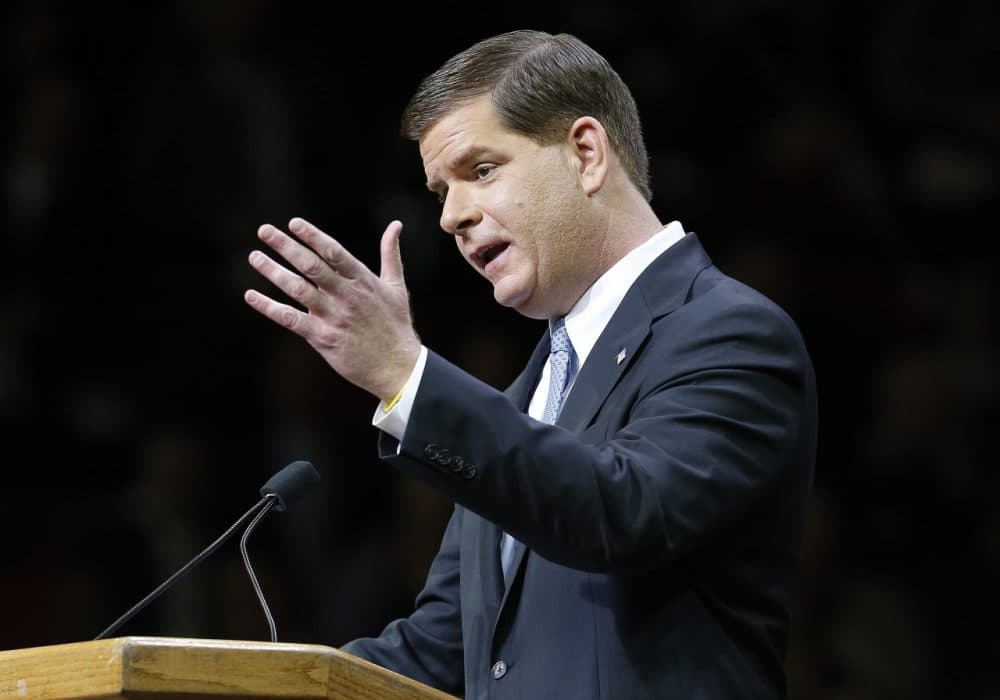 Boston Mayor Marty Walsh delivers his inaugural address in Conte Forum at Boston College. (Michael Dwyer/AP)