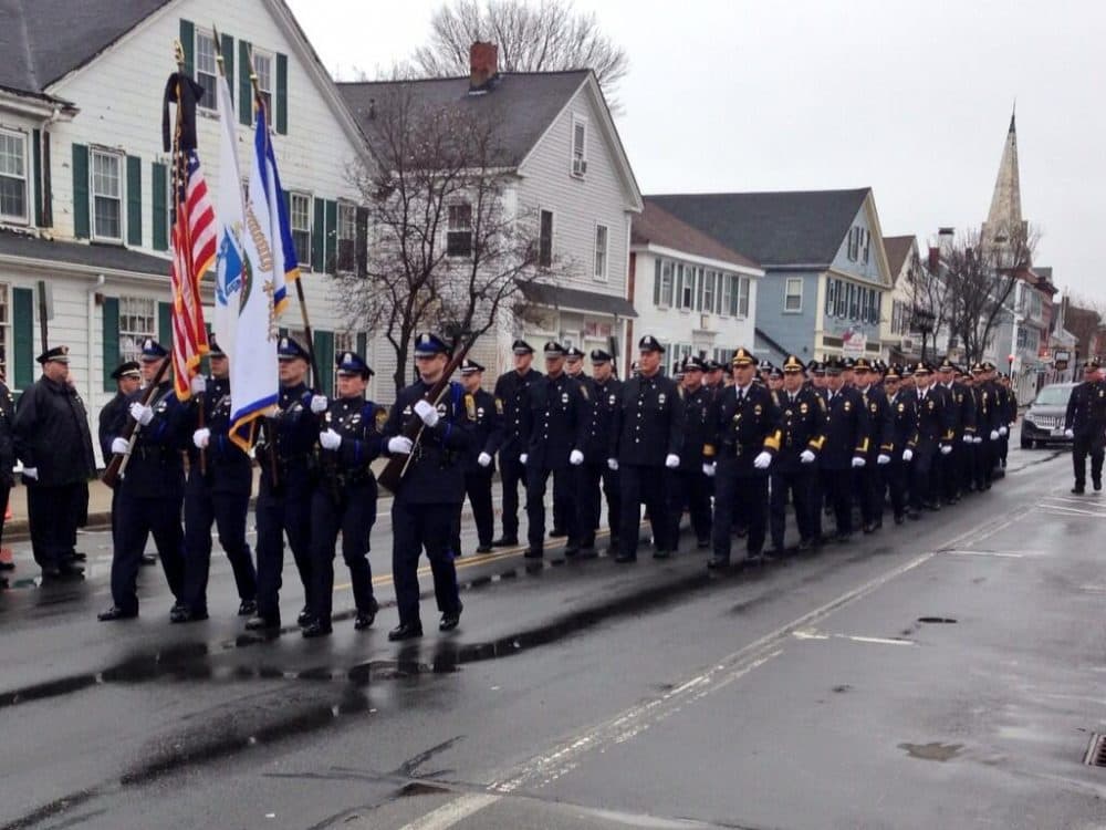 The Plymouth Police Department marches to Greg Maloney's funeral service. (Mass. State Police)