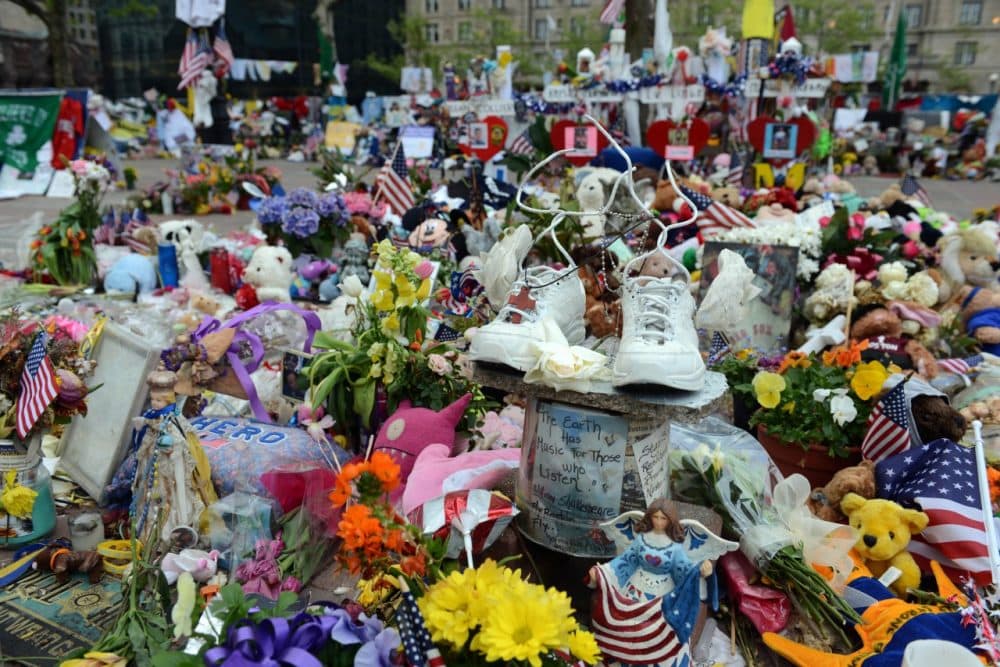 Memorials to the victims of the 2013 Boston Marathon Bombing like this one on Boylston street, sprung up all over the city. (Darren McCollester/Getty Images)