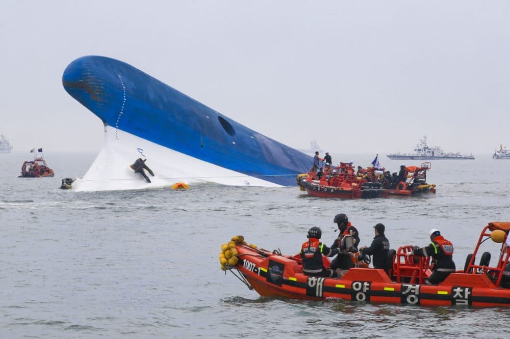In this handout provided by Donga Daily, The Republic of Korea Coast Guard work at the site of ferry sinking accident off the coast of Jindo Island on April 16, 2014, in Jindo-gun, South Korea. (Park Young-Chul/Donga Daily via Getty Images)