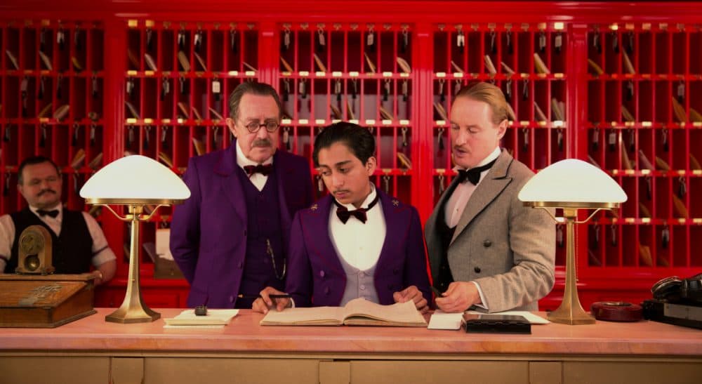 Does our cultural appetite for &quot;true stories&quot; in art suggest that we are starved for them in cyberspace? This image released by Fox Searchlight shows Tom Wilkinson, Tony Revolori, center, and Owen Wilson, right, in &quot;The Grand Budapest Hotel.&quot; (AP)