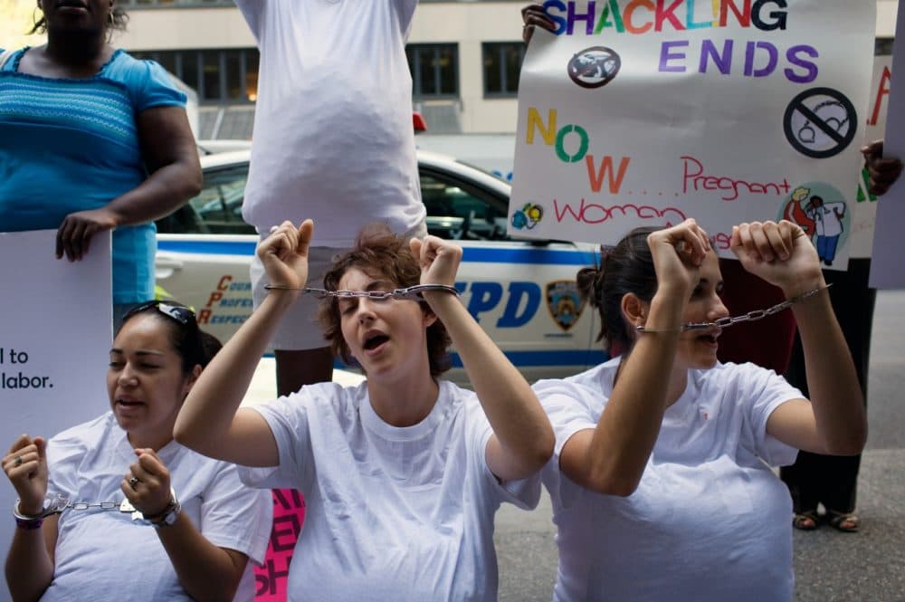 The Correctional Association of New York's Women in Prison Project, New York Civil Liberties Union, and Women on the Rise Telling Her Story (WORTH), hold a protest in front of Gov. David Paterson's office in New York, to call on the governor to sign the Anti-Shackling Bill. (Yanina Manolova/AP)
